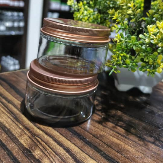 100ml Transparent flat jar with rose gold covers
